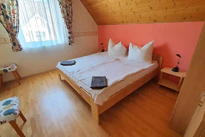 Ferienwohnung mit Kinderspielplatz und Balkon