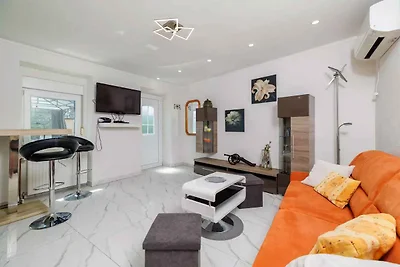 Ferienwohnung mit Klimaanlage und Terrasse mi