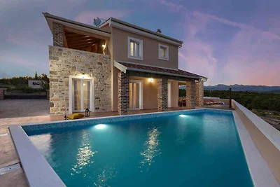 Ferienhaus mit Meerblick und Pool