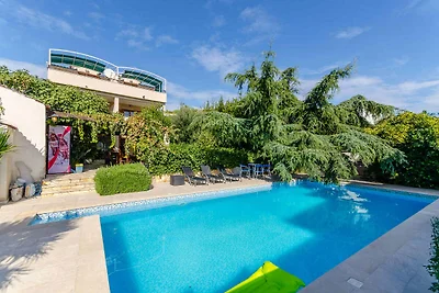 Ferienwohnung mit Swimmingpool und Balkon