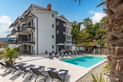 Ferienwohnung mit Pool und Meerblick