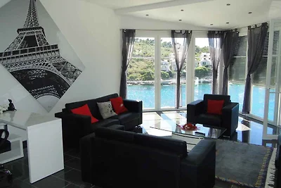 Ferienwohnung mit Poolnutzung und Meerblick