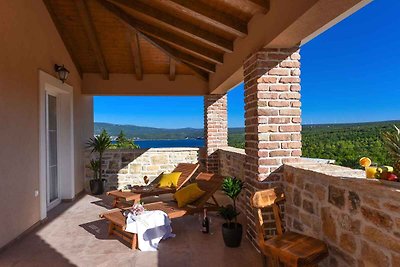 Ferienhaus mit Meerblick und Pool