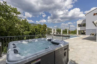 Ferienhaus mit Terrasse und Pool und