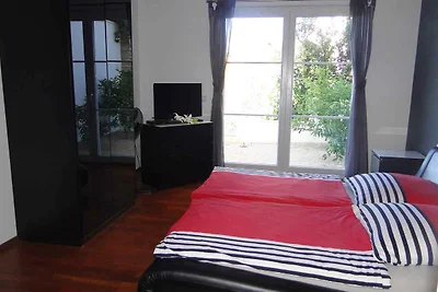 Ferienwohnung mit Poolnutzung und Meerblick