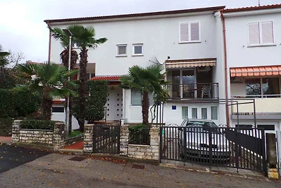 Ferienhaus mit Balkon und Klimaanlage