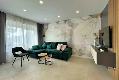 Ferienwohnung mit Terrasse und Klimaanage