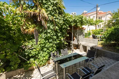 Ferienwohnung mit Garten und Klimaanlage