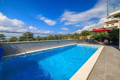 Ferienhaus mit Swimmingpool und Meerblick
