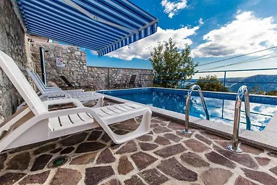 Ferienhaus mit Aussenpool und Meerblick
