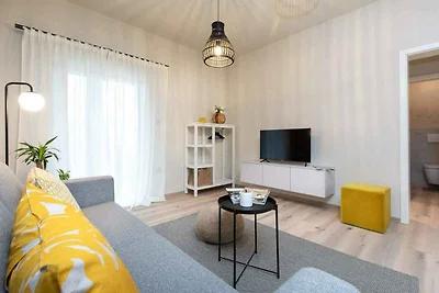 Ferienwohnung mit Pool und Meerblick