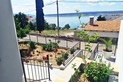 Ferienhaus mit Pool und Meerblick