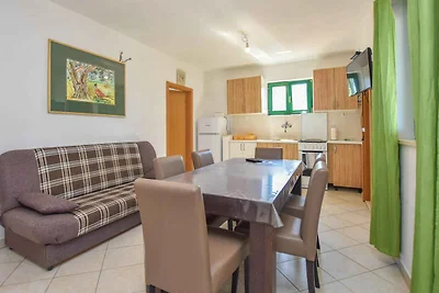Ferienhaus mit Balkon, Grillmöglichkeit und