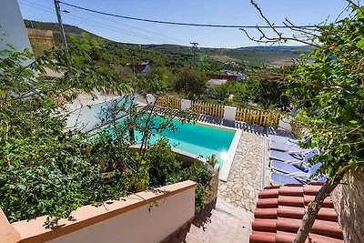 Ferienhaus mit Pool und Meerblick