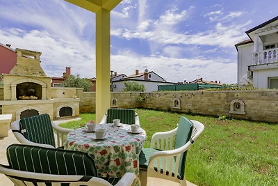 Ferienwohnung mit Garten und Klimaanlage