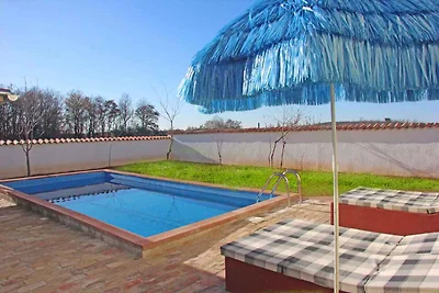 Ferienhaus mit Pool und Fitness