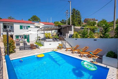 Ferienhaus mit Pool und Meerblick