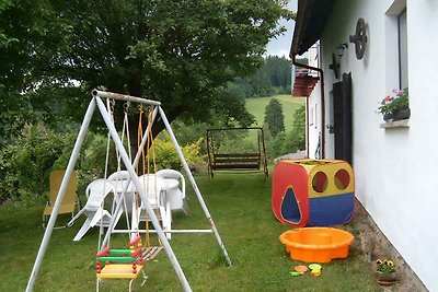 Ferienhaus mit Babybett und SAT-TV