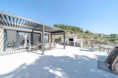 Ferienhaus mit Terrasse und Meerblick