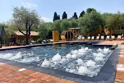 Mobilehome mit Terrasse mit Seeblick, Pool un