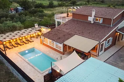 Ferienhaus mit Klimaanlage und Aussenpool