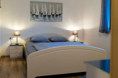 Ferienwohnung mit Grill und Terrasse, modern