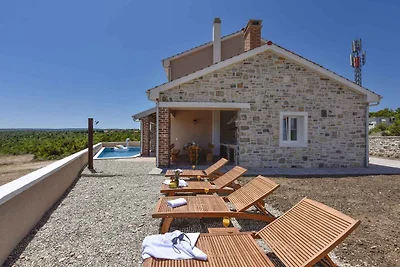 Ferienhaus mit Meerblick und Pool