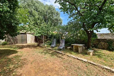 Ferienhaus mit Garten und Klimaanlage