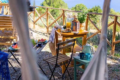 Ferienhaus im Wald mit Terrasse