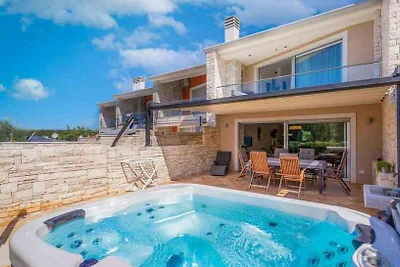 Ferienhaus mit Whirlpool und Meerblick in