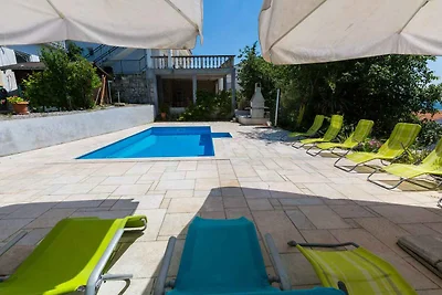 Ferienwohnung mit Pool und Meerblick