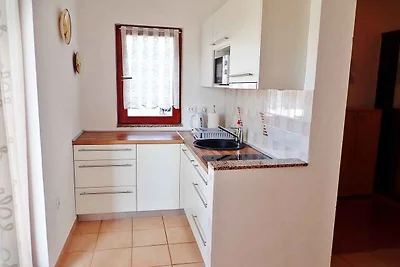 Ferienwohnung mit Garten und Klimaanlage