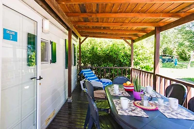 Mobilehome mit Klimaanlage und Holzveranda