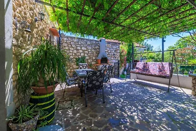 Ferienhaus mit Terrasse und Whirlpool