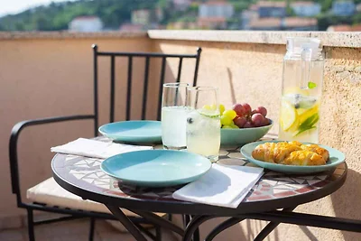 Ferienhaus mit Balkon
