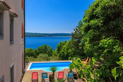 Ferienwohnung mit Pool und Meerblick