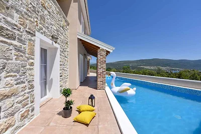 Ferienhaus mit Meerblick und Pool