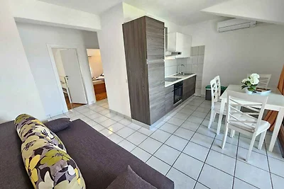 Ferienwohnung mit Garten und Klimaanlage