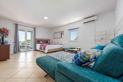 Ferienwohnung im zweiten Stock mit Meerblick