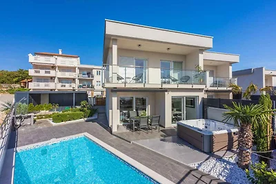 Ferienhaus mit Swimmingpool und Meerblick