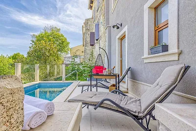 Ferienhaus mit beheiztem Privatpool