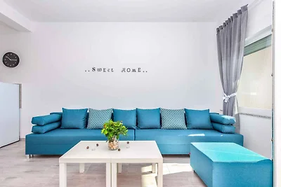 Ferienwohnung mit Pool- und Meerblick