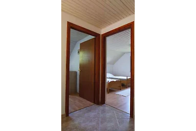 Ferienhaus mit Balkon und Garten