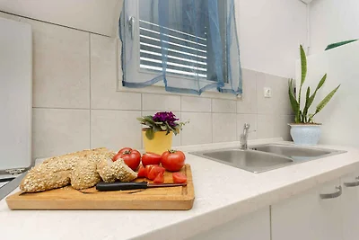 Ferienwohnung mit Garten und Klimaanlage