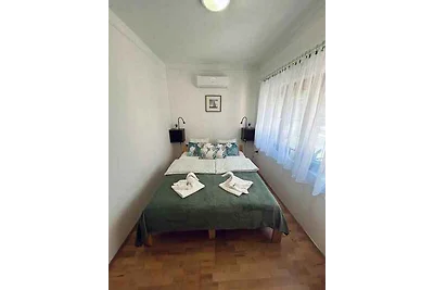Ferienhaus mit Terrasse und Klimaanlage