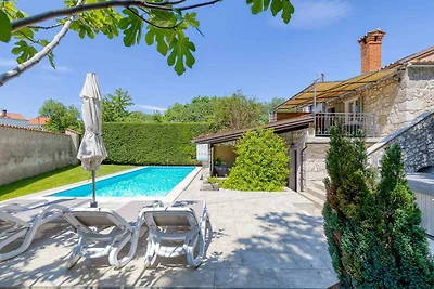 Ferienhaus mit Terrasse, Garten und privatem
