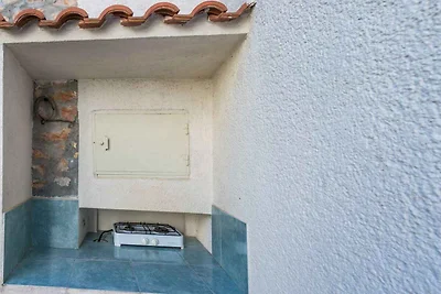 Ferienhaus mit Garten und Klimaanlage