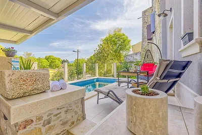 Ferienhaus mit beheiztem Privatpool