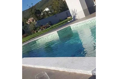 Ferienhaus mit Pool und Meerblick