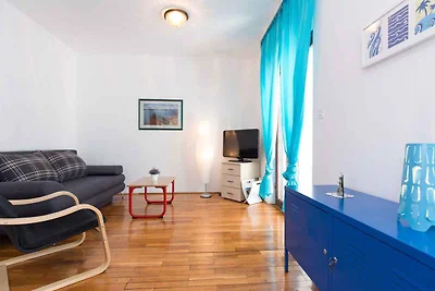 Ferienwohnung mit einer überdachten Terrasse